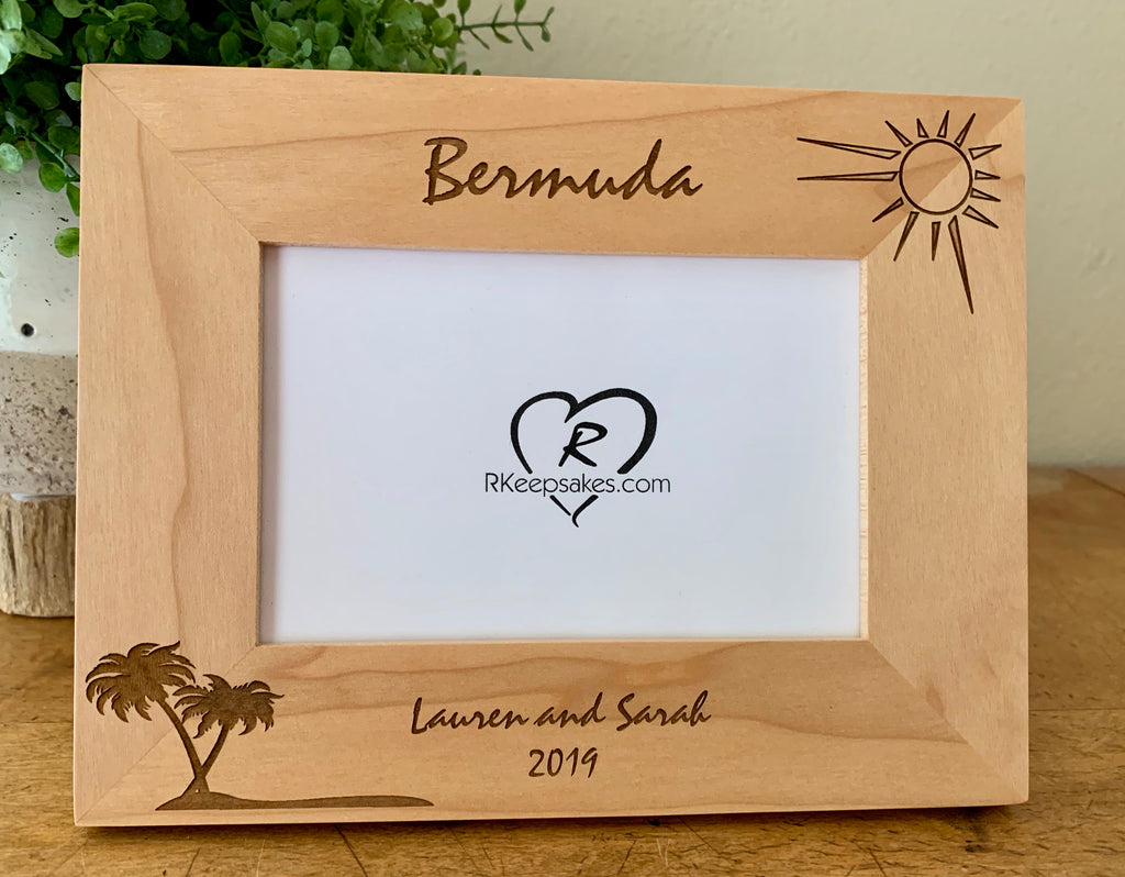 Personalized Island Vacation Picture Frame with custom text and palm tree images engraved, in alder
