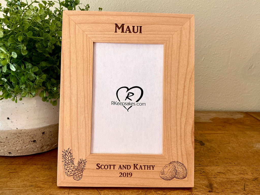 Tropical Vacation Picture frame with custom text and engraved images of pineapples and coconuts, vertical