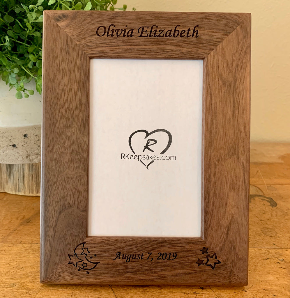 Personalized baby frame in walnut, with custom text and moon, stars engraved at bottom